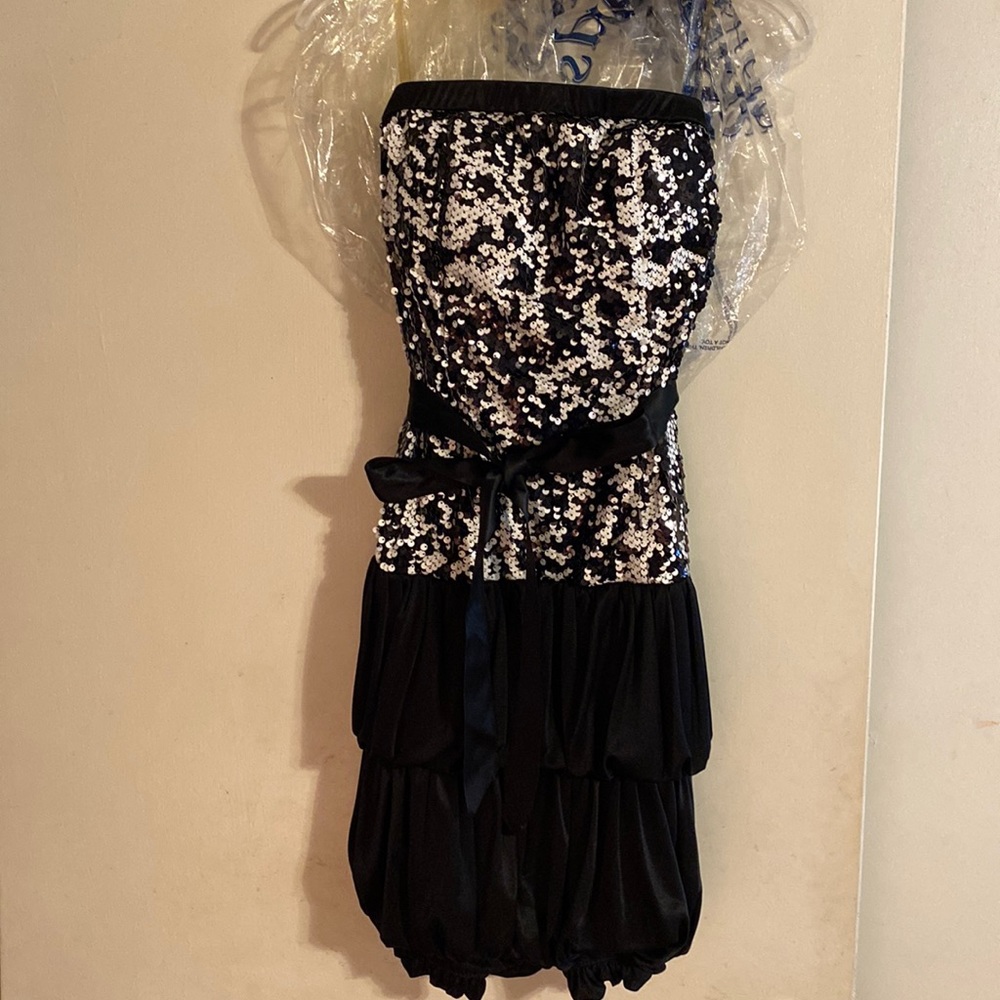Brand: Sequin Hearts, size 13, bought from Dillards and was only worn once.